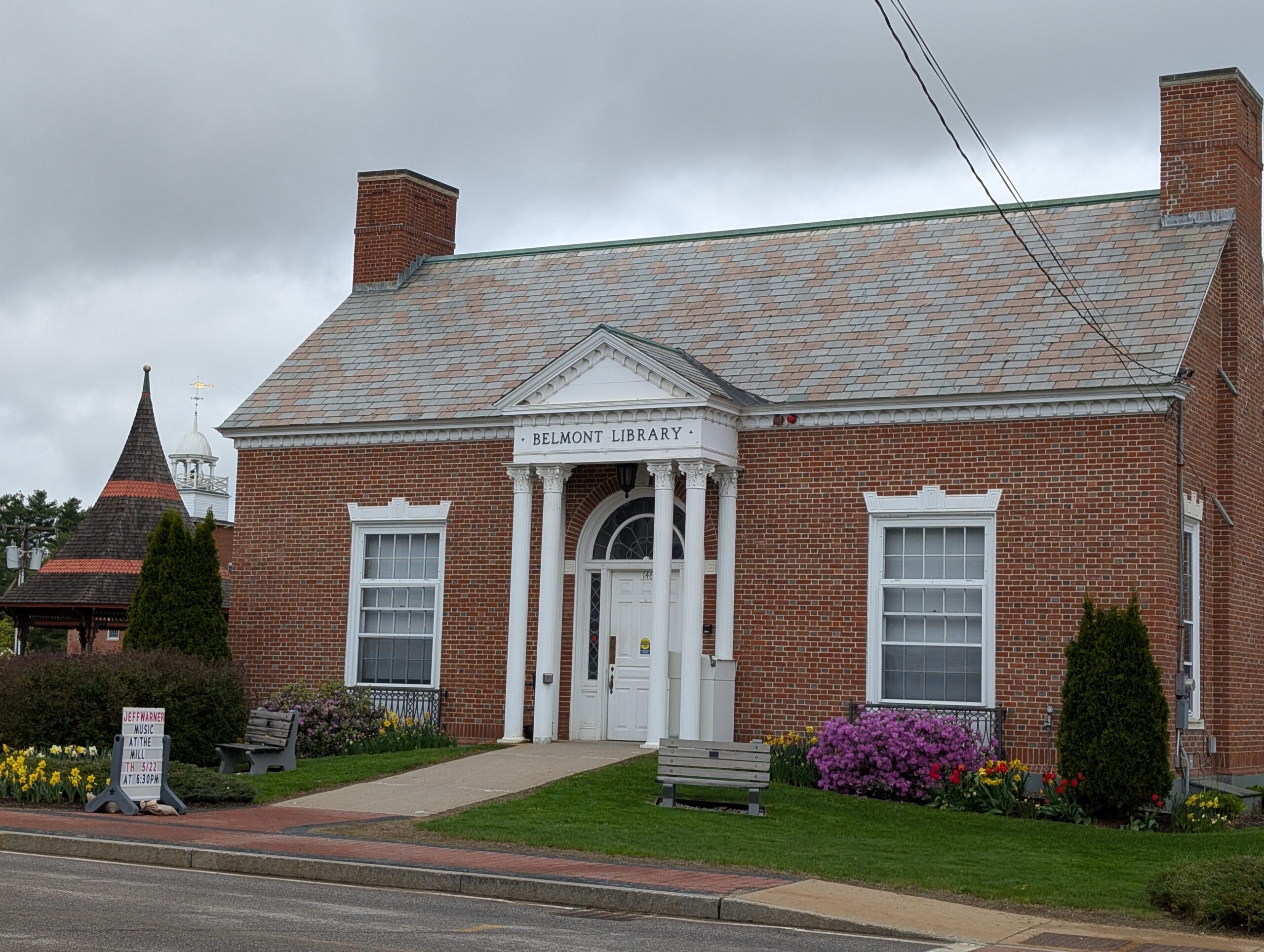 A modern photo of the front exterior of the Belmont Library taken at an angle
